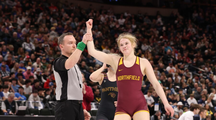 Caley Graber wins the state title at the state wrestling meet.