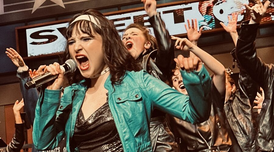 Students perform during Rock and Roll Revival.