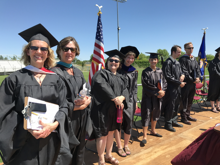 Staff at graduation ceremony